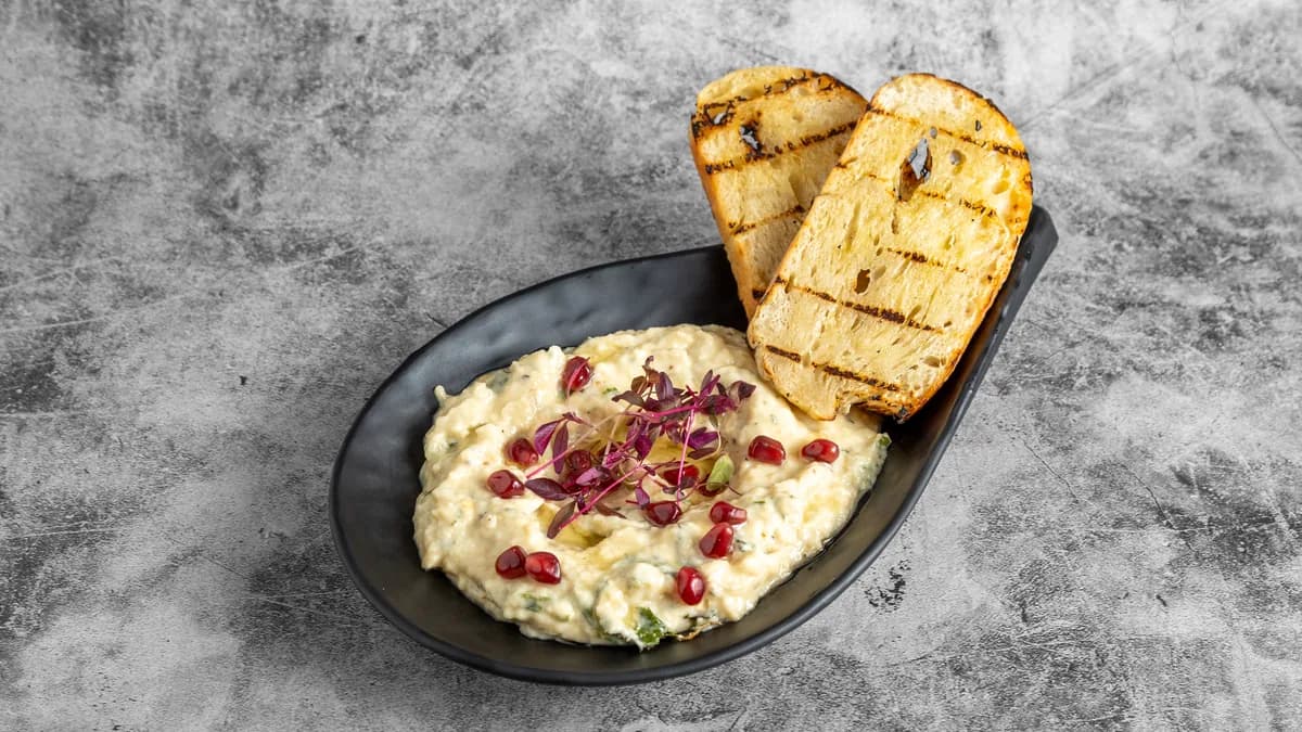 Prime Fire aubergine dip served with toasted bread