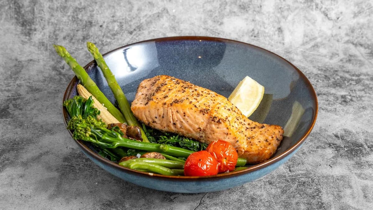 Prime Fire grilled salmon with seasonal vegetables